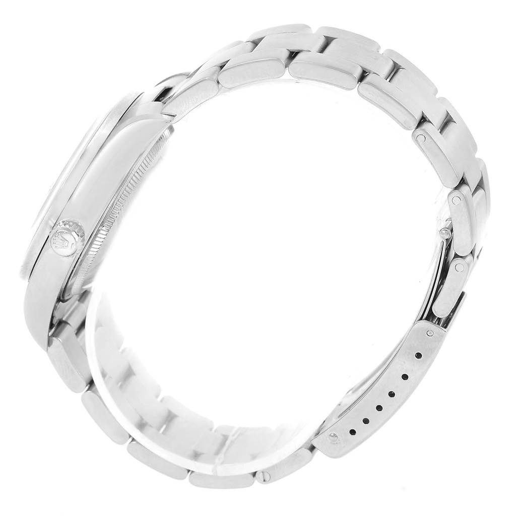 The image shows a side view of a Rolex Date 15210 Men's Stainless Steel Black Dial 15210 Men's Stainless Steel Black Dial model watch, highlighting the case, crown, and bracelet.