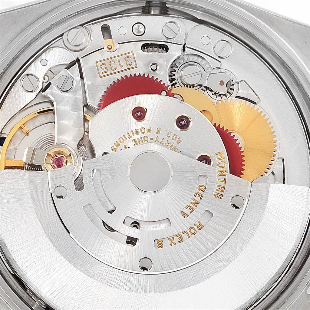 This image shows an internal close-up of the movement mechanism in a Rolex Date 15210 Men's Stainless Steel Black Dial 15210 Men's Stainless Steel Black Dial model watch.