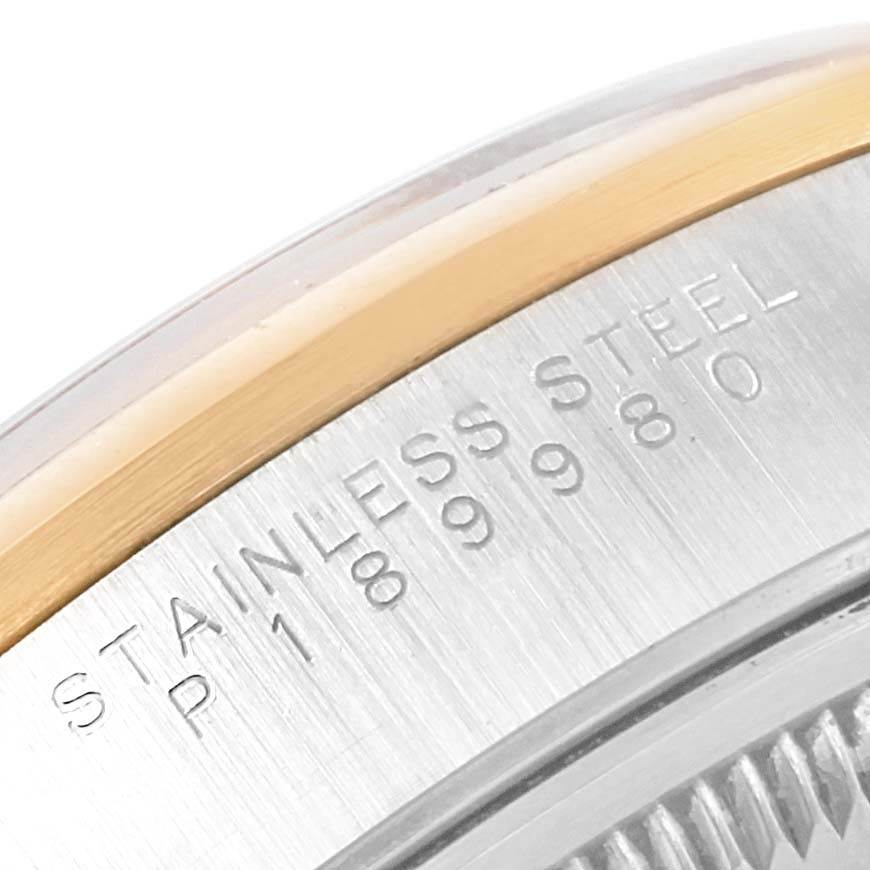 This close-up image shows the engraved case back of a Rolex Date 15203 Men's Steel and Gold (two tone) White Dial 15203 Men's Steel and Gold (two tone) White Dial model watch, highlighting the stainless steel material and serial number.