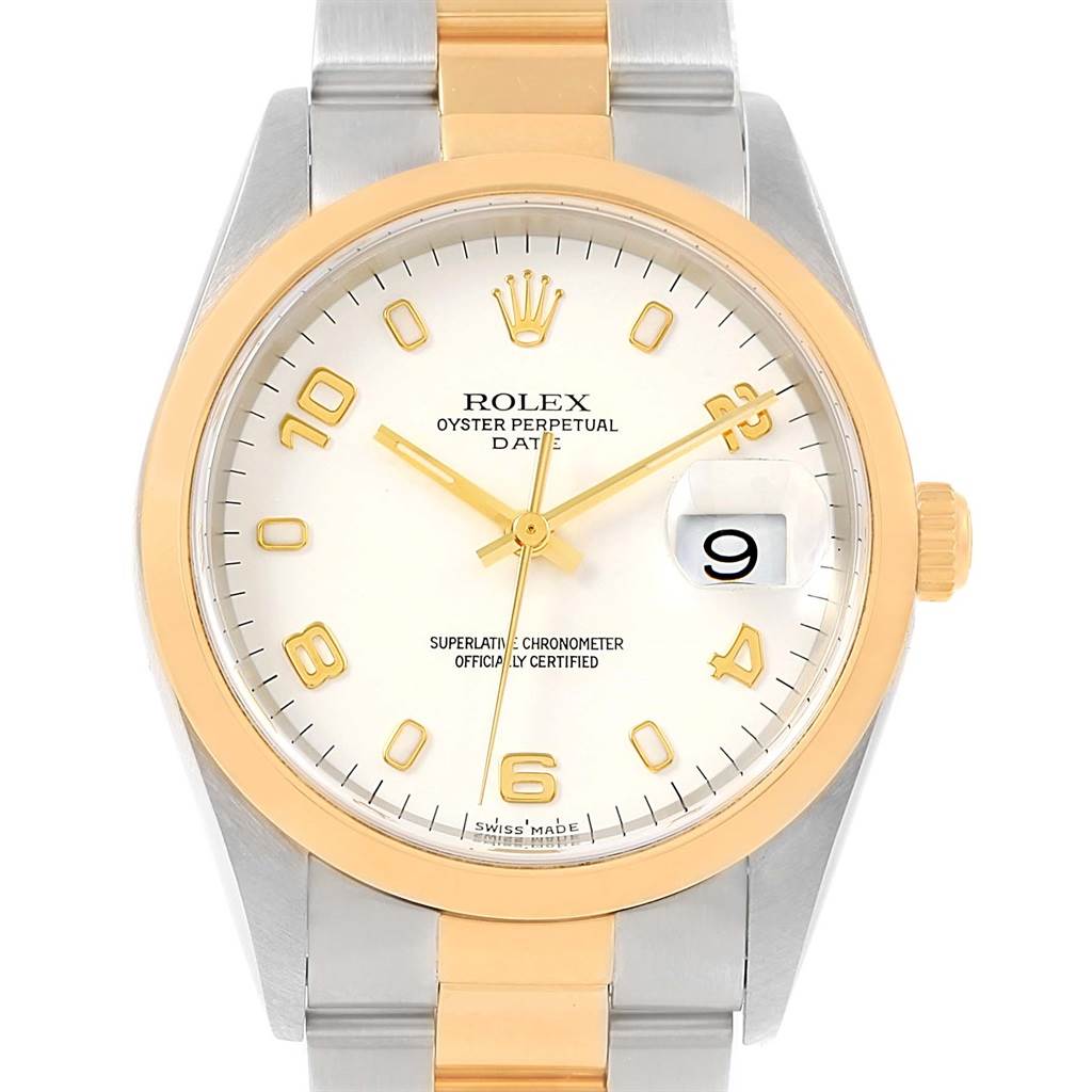 The image shows a front view of the Rolex Date 15203 Men's Steel and Gold (two tone) White Dial 15203 Men's Steel and Gold (two tone) White Dial model watch, displaying the dial, hands, bezel, and part of the bracelet.