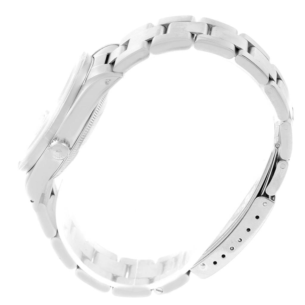 This is a side view of the Rolex Date 15210 Men's Stainless Steel Black Dial 15210 Men's Stainless Steel Black Dial model watch, showing the case, crown, and bracelet with clasp.