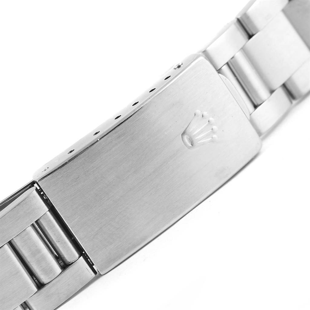 This image shows the clasp and part of the bracelet of a Rolex Date 15210 Men's Stainless Steel Black Dial 15210 Men's Stainless Steel Black Dial model watch from a side angle.