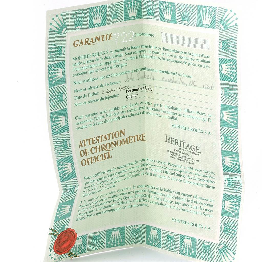 This image shows the warranty and certification document for a Rolex Date 15210 Men's Stainless Steel Silver Dial 15210 Men's Stainless Steel Silver Dial model watch.