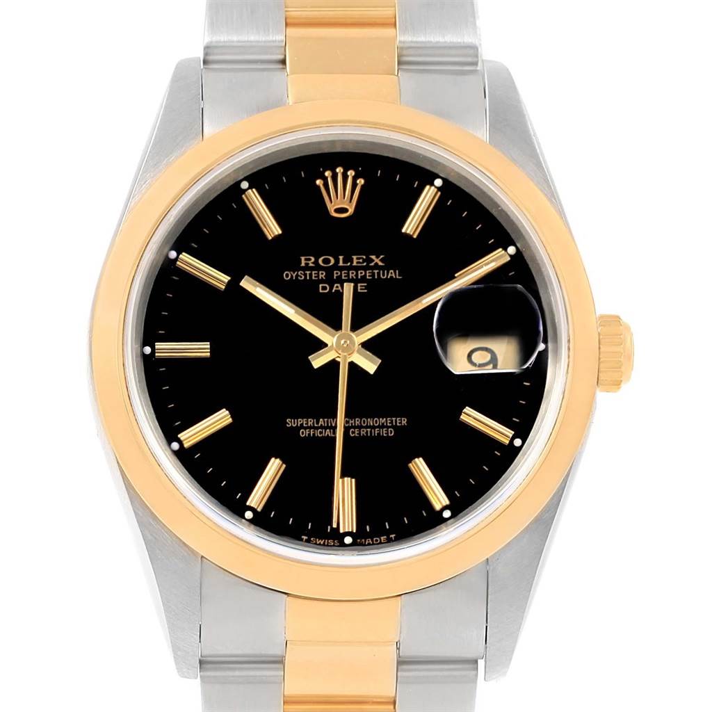 The image shows a front view of a Rolex Date 15203 Men's Steel and Gold (two tone) Black Dial 15203 Men's Steel and Gold (two tone) Black Dial model watch with a black dial and gold and silver bracelet.
