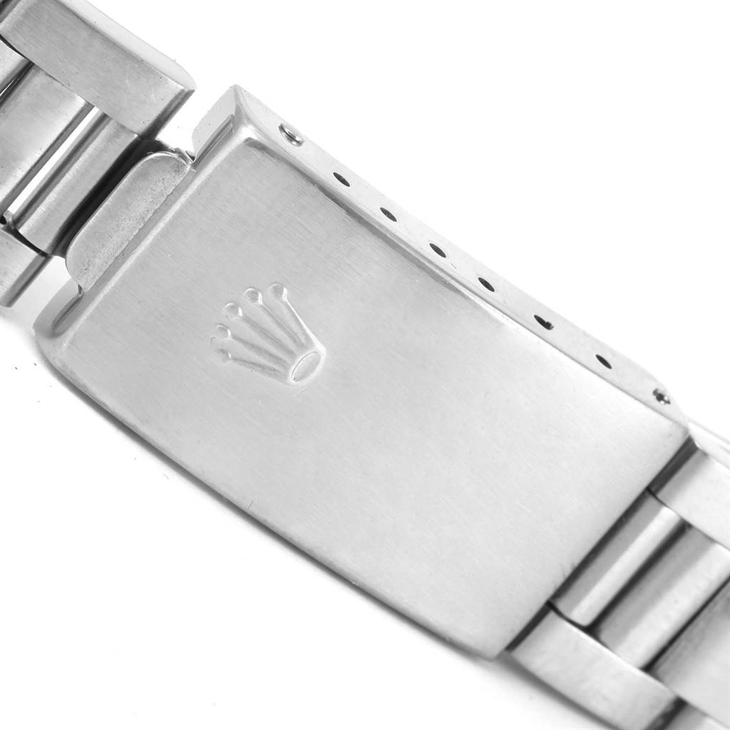 The image shows a detailed view of the clasp and part of the bracelet of a Rolex Date 15200 Men's Stainless Steel White Dial 15200 Men's Stainless Steel White Dial model watch.