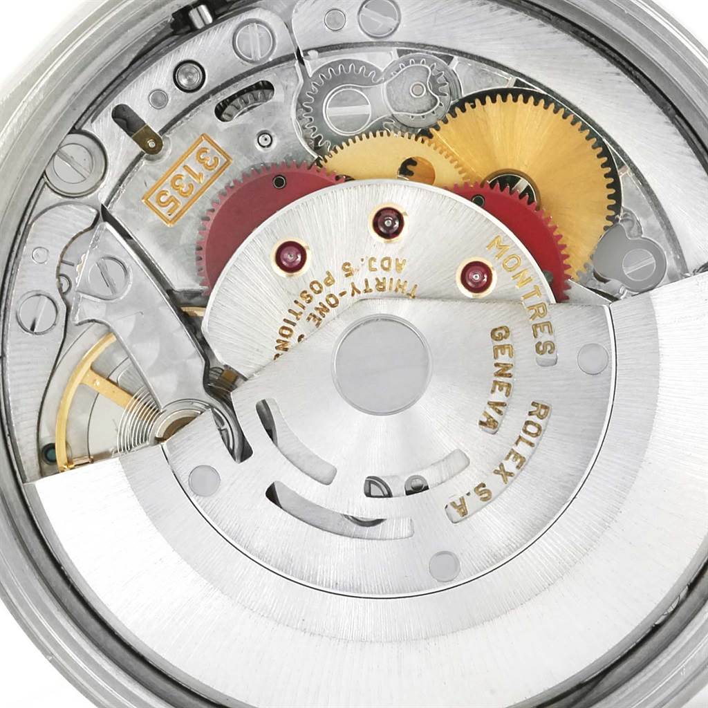 This is the movement mechanism of a Rolex Date 15200 Men's Stainless Steel White Dial 15200 Men's Stainless Steel White Dial model watch, shown from the back with gears and the rotor visible.