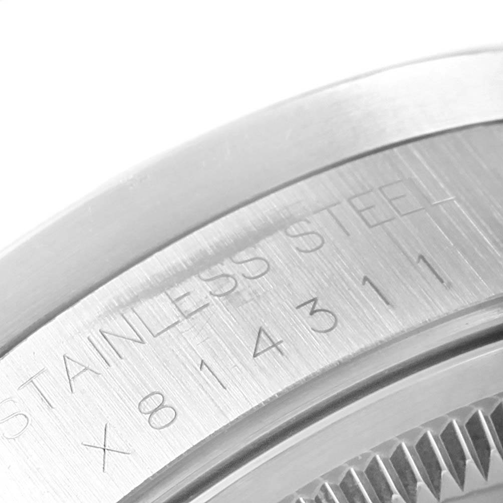 This close-up image shows the stainless steel casing and model number engraving of a Rolex Date 15210 Men's Stainless Steel Grey Dial 15210 Men's Stainless Steel Grey Dial watch.