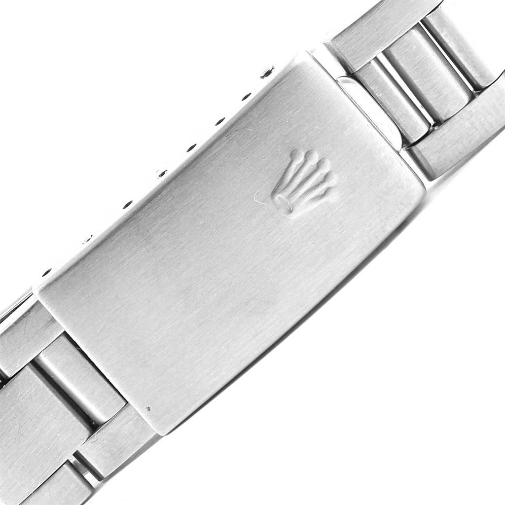 This image shows a close-up of the clasp on the bracelet of a Rolex Date 15210 Men's Stainless Steel Blue Dial 15210 Men's Stainless Steel Blue Dial watch.