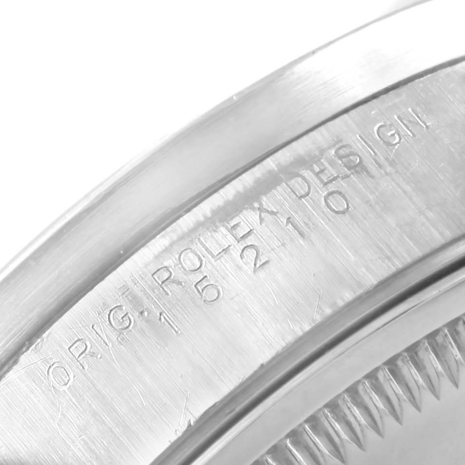 This image shows an angled close-up of the side case and etched bezel of a Rolex Date 15210 Men's Stainless Steel Blue Dial 15210 Men's Stainless Steel Blue Dial model watch.
