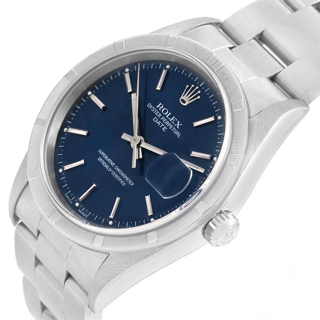 This image shows a angled view of a Rolex Date 15210 Men's Stainless Steel Blue Dial 15210 Men's Stainless Steel Blue Dial model watch, highlighting its blue dial, silver casing, and metal bracelet.