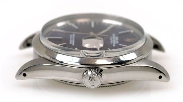 This image shows a side view of a Rolex Date 15000 Men's Stainless Steel Purple Dial 15000 Men's Stainless Steel Purple Dial model watch, highlighting the crown and lugs.