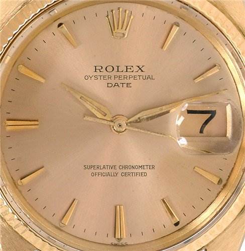 This is a close-up shot of the dial of a Rolex Date 1503 Men's Yellow Gold Champagne Dial 1503 Men's Yellow Gold Champagne Dial model watch, showing the hands, markers, date window, and branding.