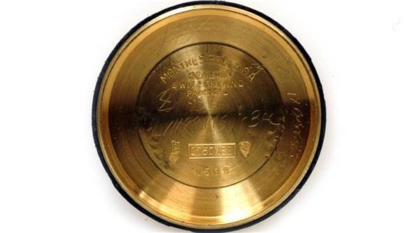 This image shows the inside of the gold case back of a Rolex Date 1503 Men's Yellow Gold Champagne Dial 1503 Men's Yellow Gold Champagne Dial model watch.