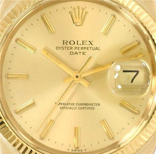 This is a close-up view of the dial of a Rolex Oyster Perpetual Date watch, showing the hands, date magnifier, and hour markers.