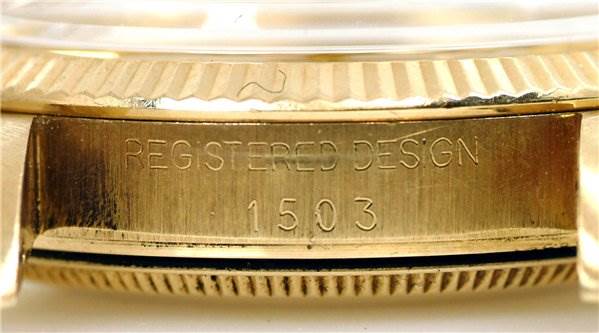 This image shows a close-up of the engraved case back side of a Rolex Date 1503 Men's Yellow Gold Champagne Dial 1503 Men's Yellow Gold Champagne Dial model 1503 watch.