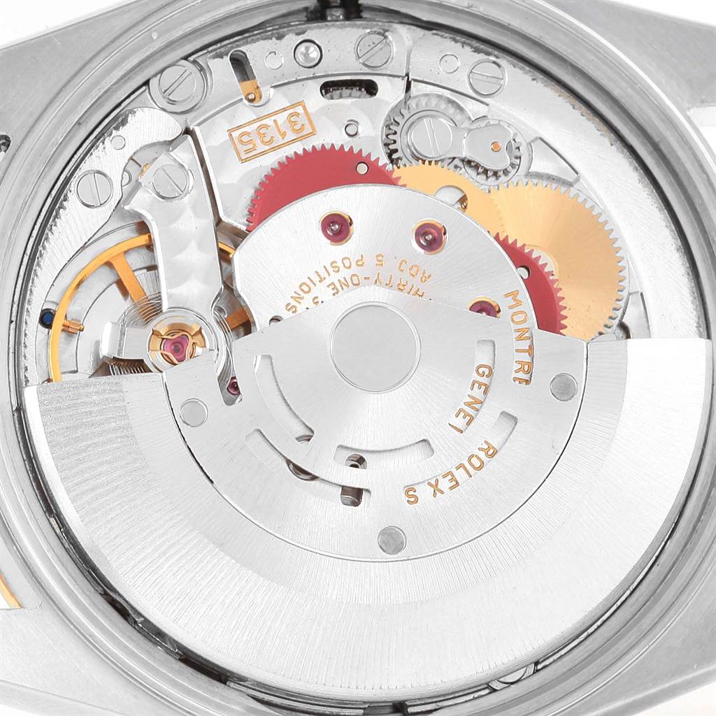 This image shows the inner mechanical movement of a Rolex Date 15223 Men's Steel and Gold (two tone) Black Dial 15223 Men's Steel and Gold (two tone) Black Dial model watch viewed from the rear.