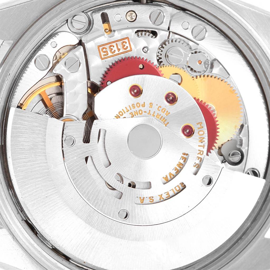 The image shows the internal mechanism of a Rolex Date 15200 Men's Stainless Steel Black Dial 15200 Men's Stainless Steel Black Dial watch, highlighting its gears and rotor from the back.