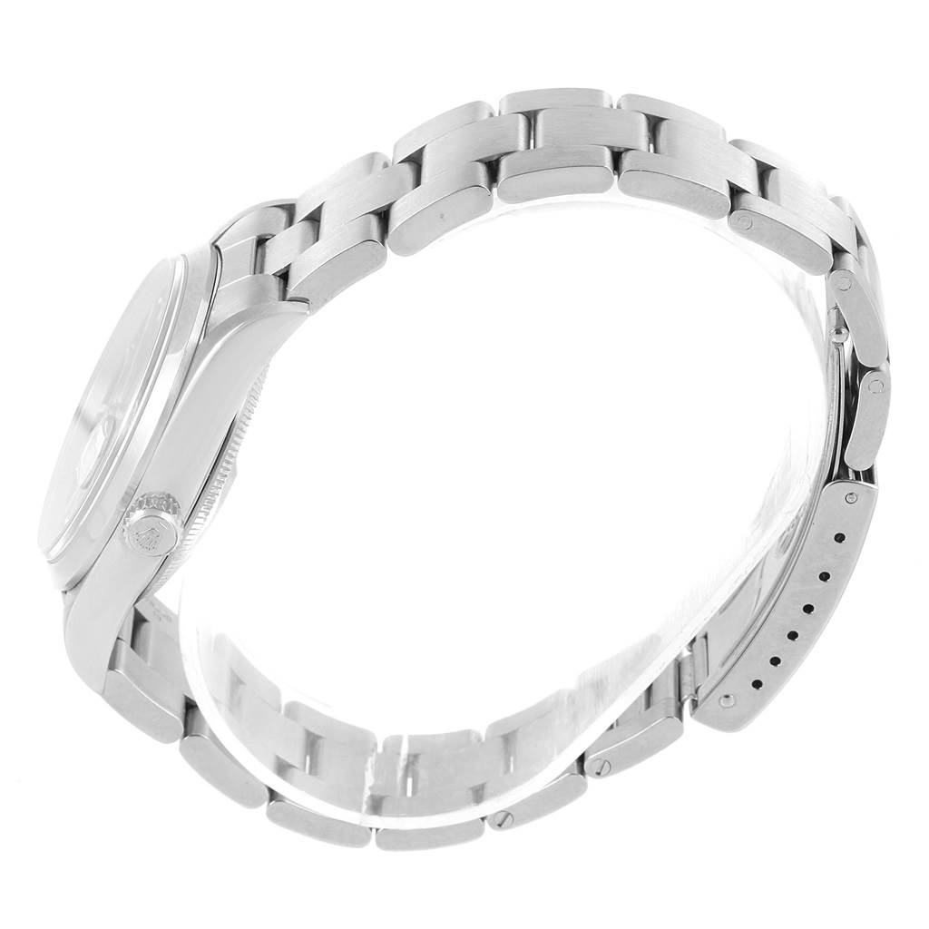 The image shows a side view of the Rolex Date 15200 Men's Stainless Steel Black Dial 15200 Men's Stainless Steel Black Dial model, highlighting its case, crown, and bracelet with the clasp open.