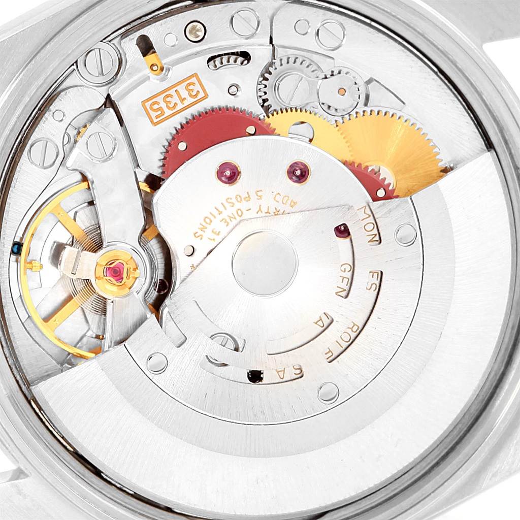 This image shows a close-up of the movement mechanism inside a Rolex Date 15200 Men's Stainless Steel Black Dial 15200 Men's Stainless Steel Black Dial model watch.