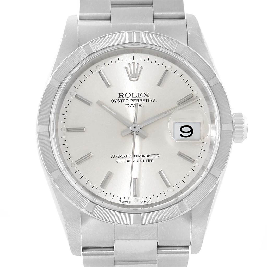 This image shows the front view of the Rolex Oyster Perpetual Date watch, highlighting the dial, bezel, hands, markers, and date window.