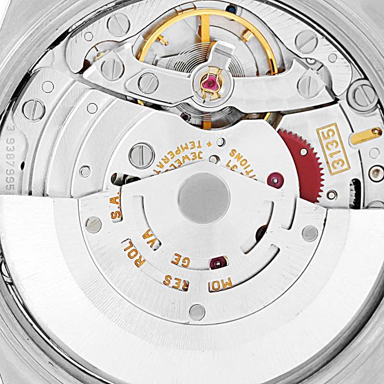 This image shows an up-close view of the movement inside a Rolex Date 15210 Men's Stainless Steel Silver Dial 15210 Men's Stainless Steel Silver Dial model watch.