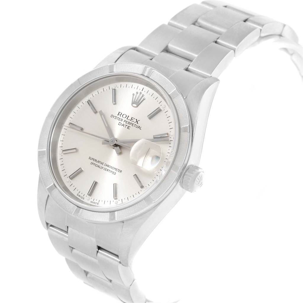 The image shows a Rolex Date 15210 Men's Stainless Steel Silver Dial 15210 Men's Stainless Steel Silver Dial model watch angled from the top right, highlighting the dial, bracelet, and crown.