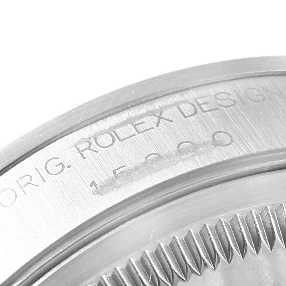 This close-up image shows the engraved case back and bezel of a Rolex Date 15200 Men's Stainless Steel Silver Dial 15200 Men's Stainless Steel Silver Dial model watch.
