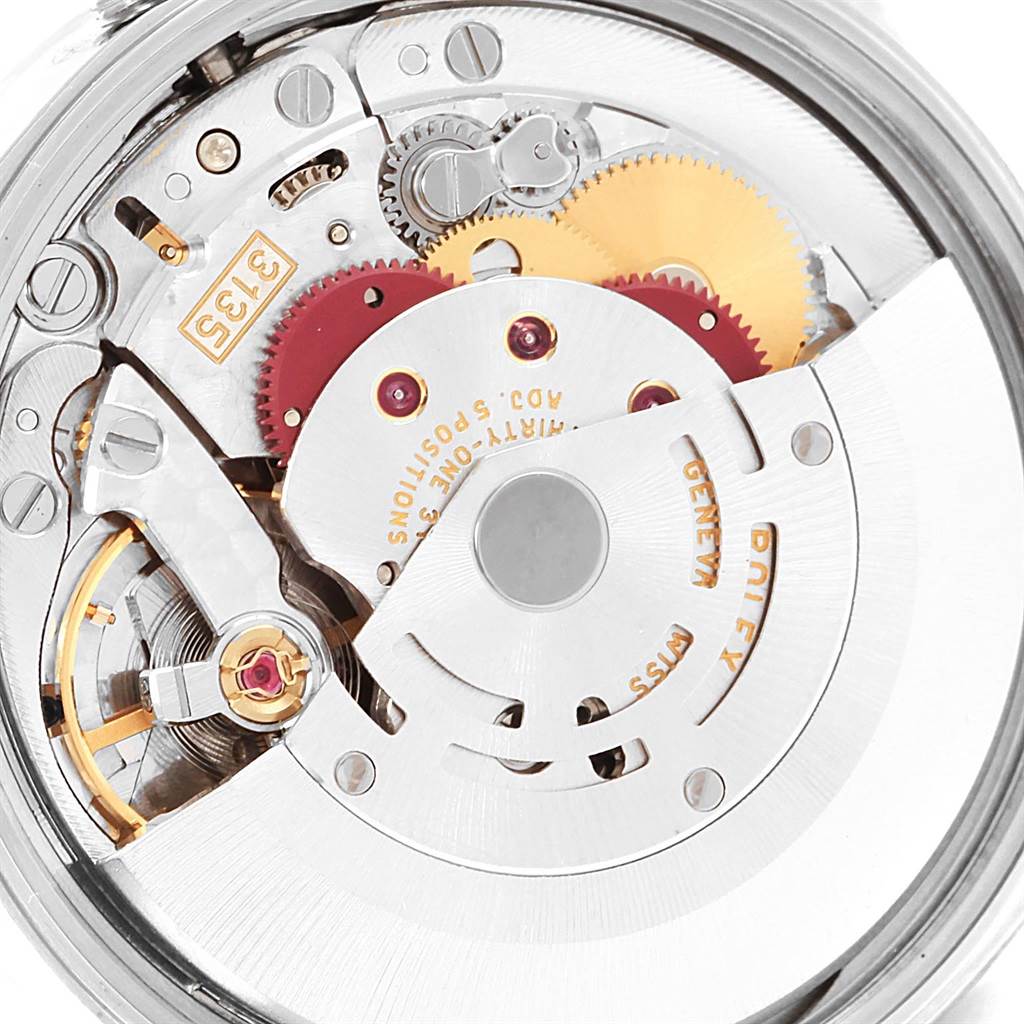 The image shows a close-up of the movement mechanism inside a Rolex Date 15210 Men's Stainless Steel Black Dial 15210 Men's Stainless Steel Black Dial model watch.
