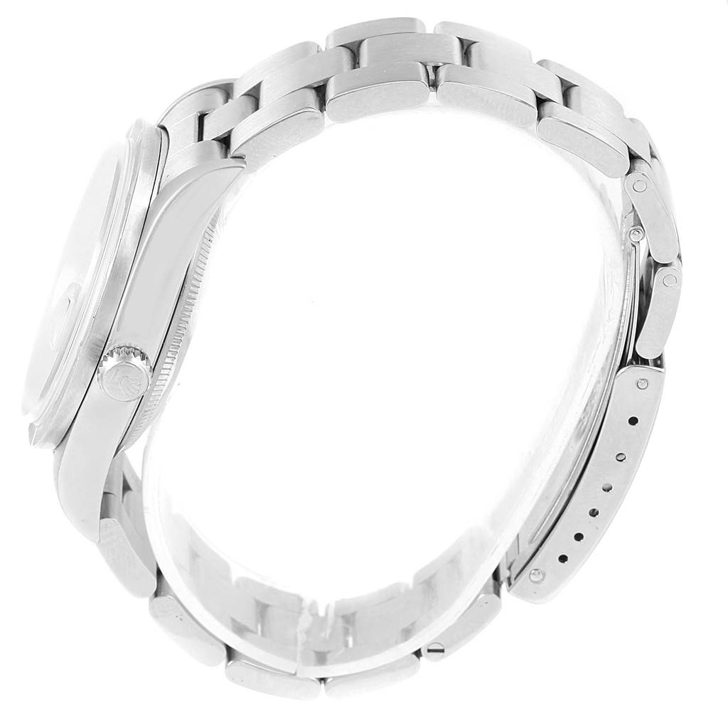 The image shows a side view of a Rolex Date 15210 Men's Stainless Steel Black Dial 15210 Men's Stainless Steel Black Dial model watch, focusing on the bracelet and the case.