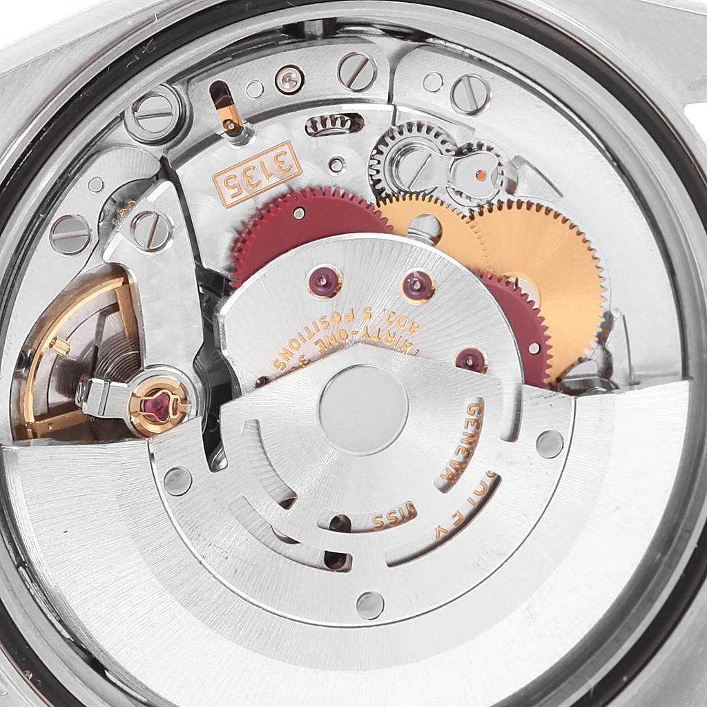 The image shows the internal mechanics and gears of a Rolex Date 16200 Men's Stainless Steel Black Dial 16200 Men's Stainless Steel Black Dial model watch from a close-up, top-down angle.