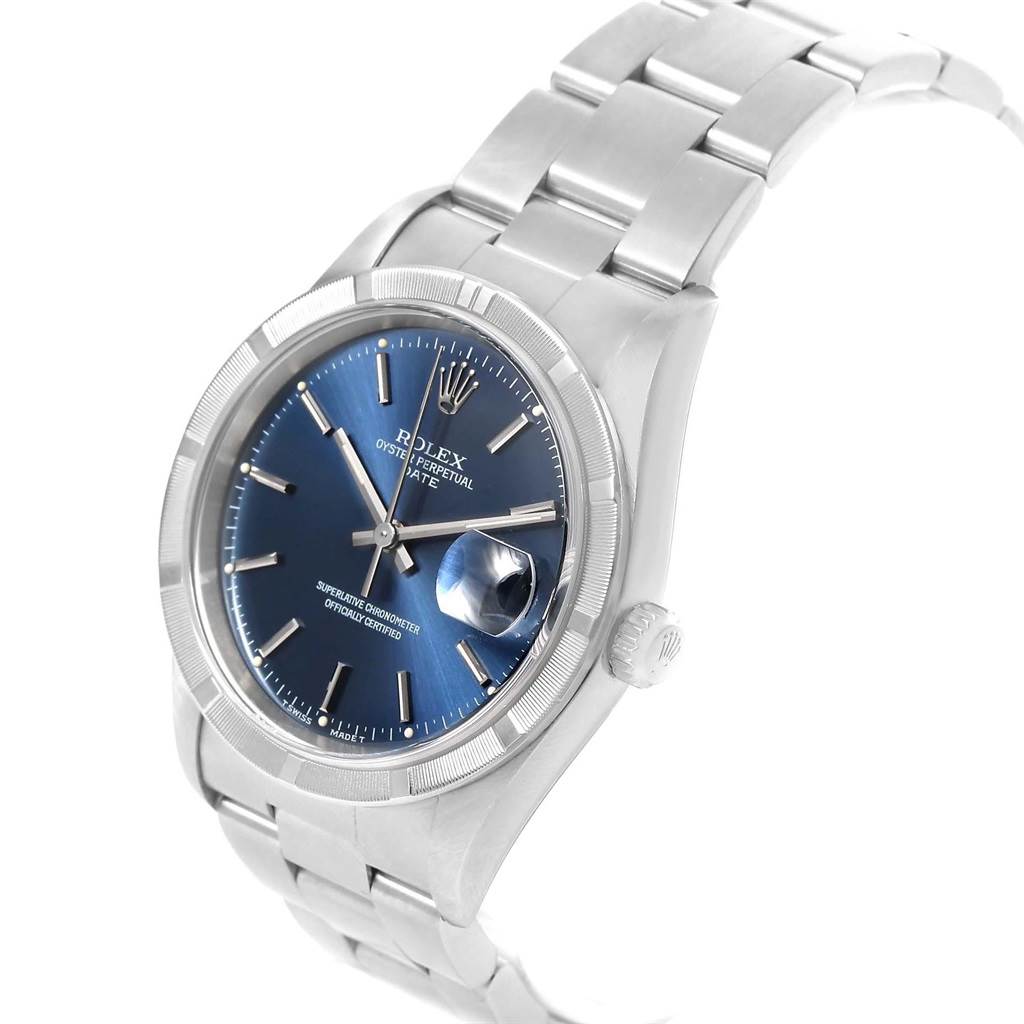 The image shows a side angle of a Rolex Date 15210 Men's Stainless Steel Blue Dial 15210 Men's Stainless Steel Blue Dial model watch highlighting its blue dial, bracelet, and crown.