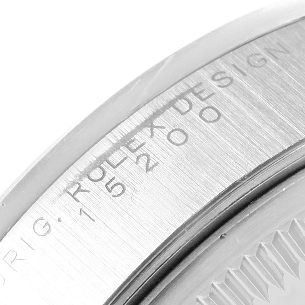 This image shows a close-up of the brushed and engraved bezel with inscriptions of a Rolex Date 15200 Men's Stainless Steel Silver Dial 15200 Men's Stainless Steel Silver Dial model watch.