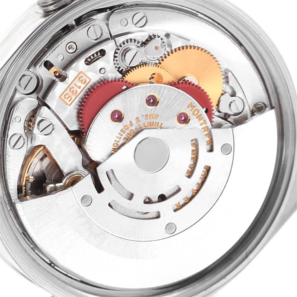 The image shows the internal mechanical movement of a Rolex Date 15200 Men's Stainless Steel Silver Dial 15200 Men's Stainless Steel Silver Dial model watch, highlighting gears and components.