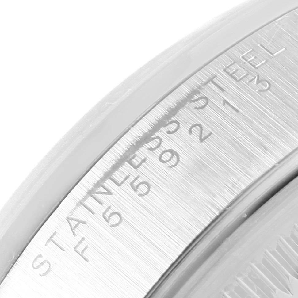 The image shows a close-up of the side of the case and part of the bezel of a Rolex Date 15200 Men's Stainless Steel Silver Dial 15200 Men's Stainless Steel Silver Dial model watch.