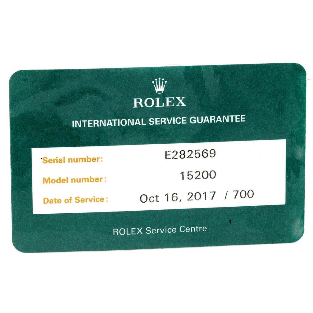 The image shows an international service guarantee card for the Rolex Date 15200 Men's Stainless Steel White Dial 15200 Men's Stainless Steel White Dial model, with serial and model numbers and service date.