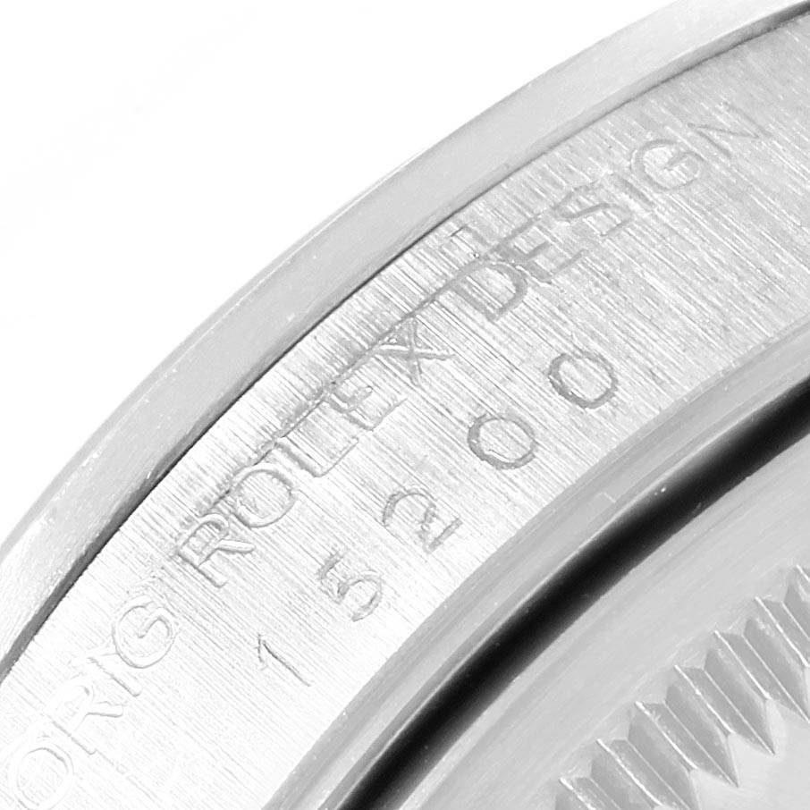 The image shows a close-up of the side engraving on the case of a Rolex Date 15200 Men's Stainless Steel White Dial 15200 Men's Stainless Steel White Dial model.