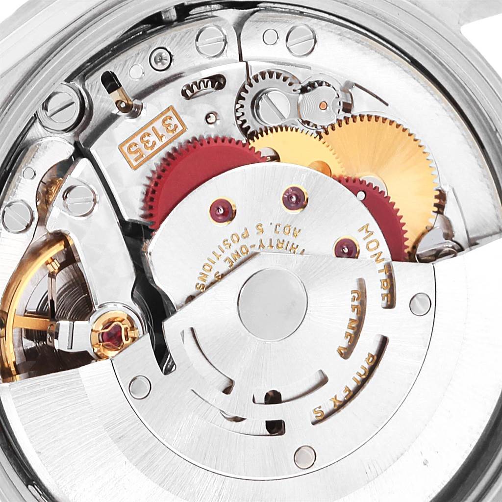 This image shows a close-up of the movement and internal mechanism of a Rolex Date 15210 Men's Stainless Steel Blue Dial 15210 Men's Stainless Steel Blue Dial model watch.