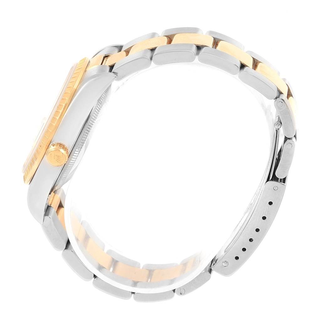 This Rolex Date 15223 Men's Steel and Gold (two tone) Black Dial 15223 Men's Steel and Gold (two tone) Black Dial watch is shown in a side view, highlighting the crown, case, and two-tone bracelet.