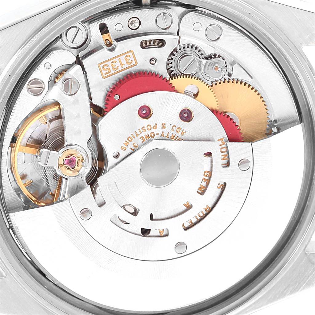 This image shows the inner mechanism and movement of a Rolex Date 15223 Men's Steel and Gold (two tone) Black Dial 15223 Men's Steel and Gold (two tone) Black Dial model watch.