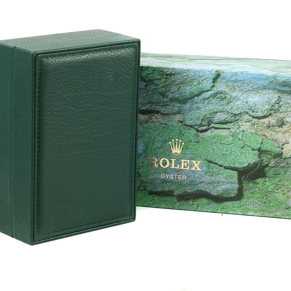 The image shows a green leather Rolex Date 15223 Men's Steel and Gold (two tone) White Dial 15223 Men's Steel and Gold (two tone) White Dial watch box and a green marbled protective outer box.