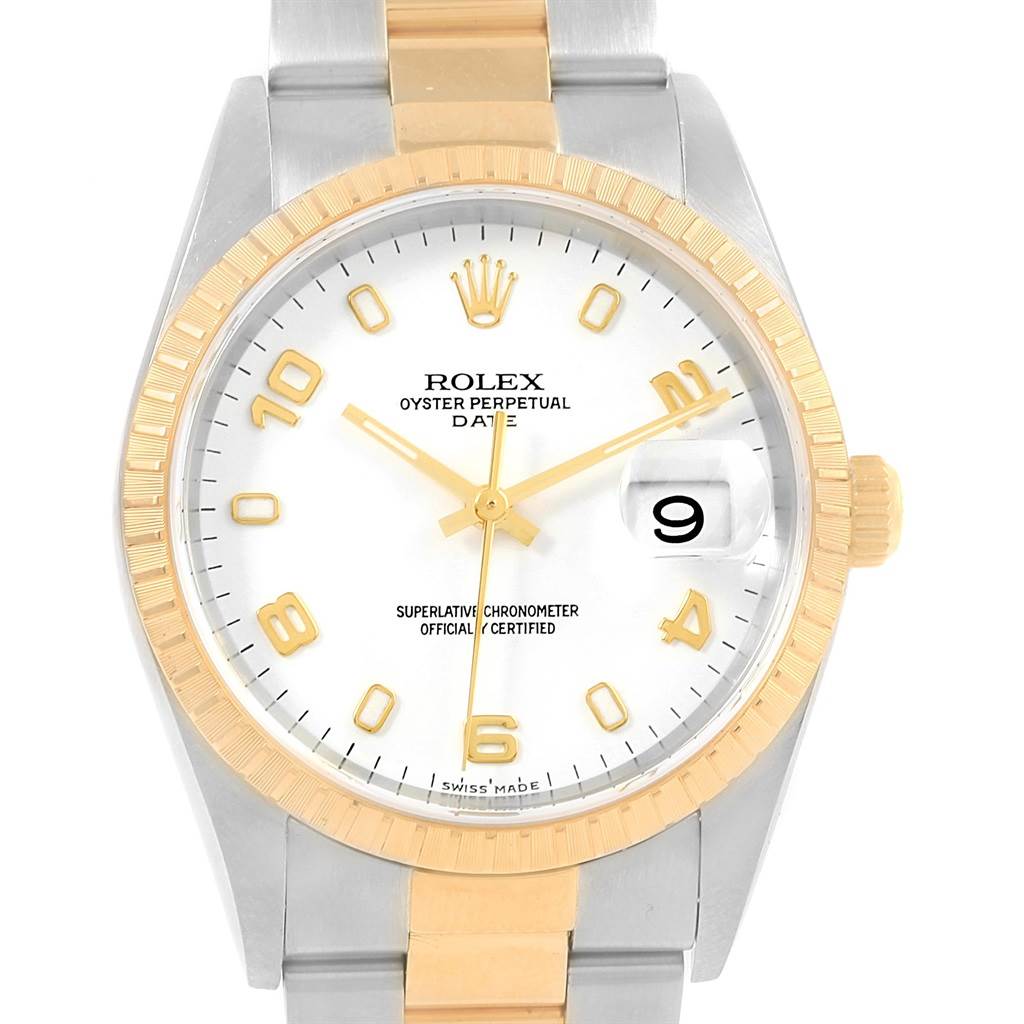 The image shows the front view of a Rolex Date 15223 Men's Steel and Gold (two tone) White Dial 15223 Men's Steel and Gold (two tone) White Dial model watch, displaying its dial, bezel, and part of the bracelet.