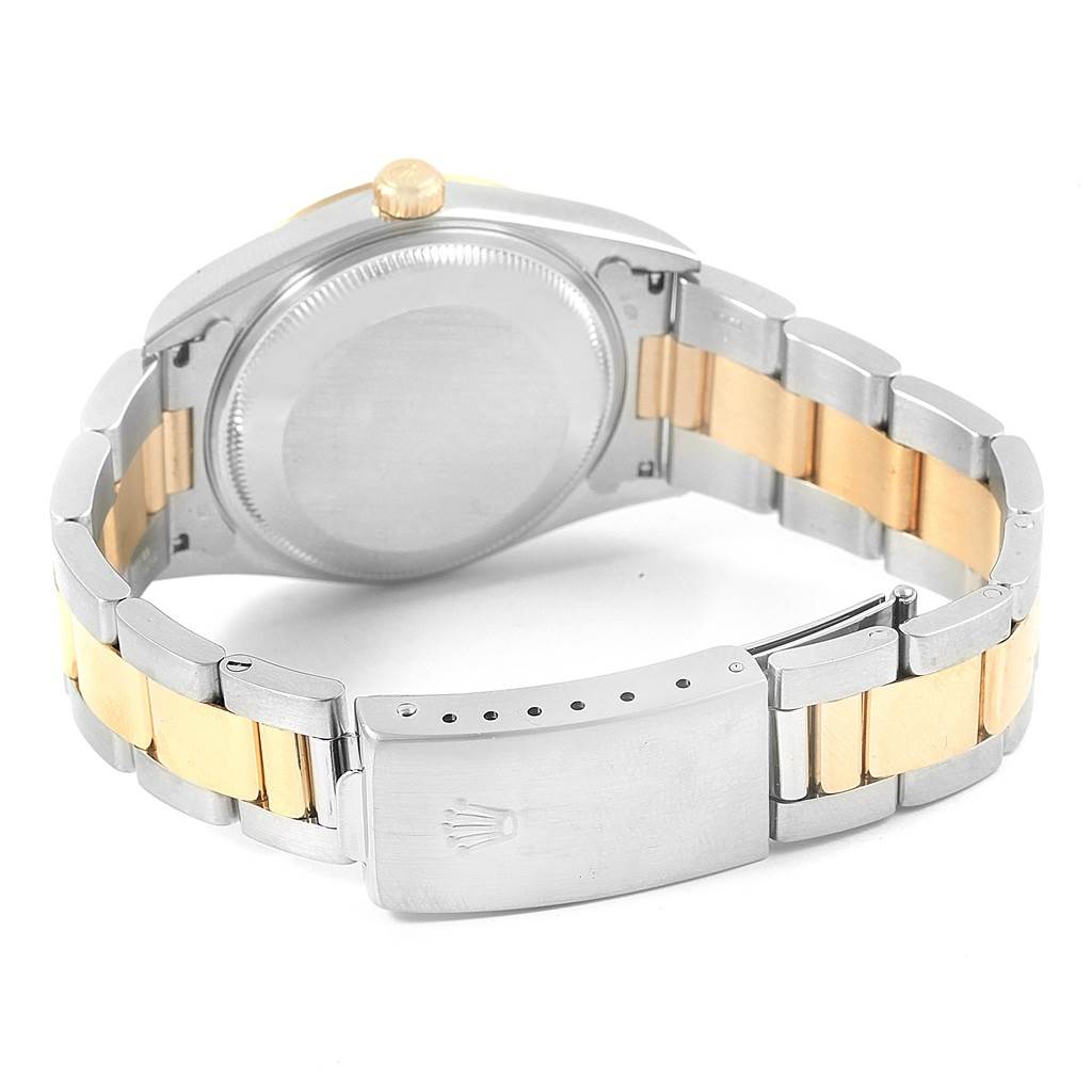 This image shows the back of a Rolex Date 15223 Men's Steel and Gold (two tone) White Dial 15223 Men's Steel and Gold (two tone) White Dial model watch, focusing on the case back, crown, and two-tone bracelet with a clasp.