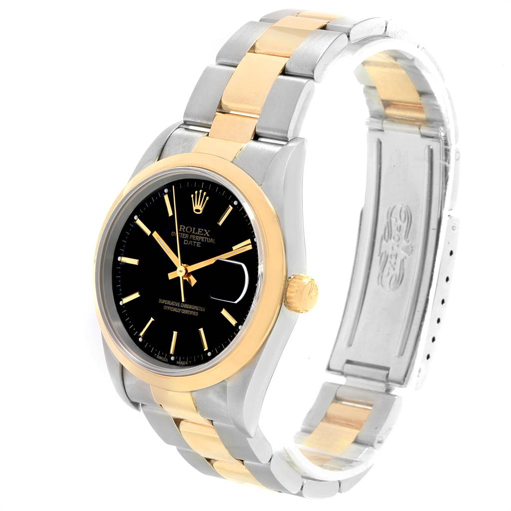 This image shows a side angle of a Rolex Date 15203 Men's Steel and Gold (two tone) Black Dial 15203 Men's Steel and Gold (two tone) Black Dial model watch, displaying its black dial, two-tone bracelet, and partially open clasp.