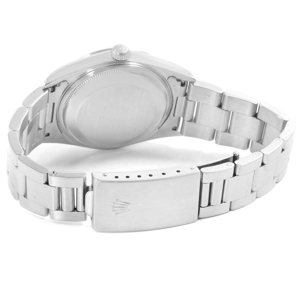 The image shows the clasp, bracelet, case back, and crown of a Rolex Date 15200 Men's Stainless Steel Silver Dial 15200 Men's Stainless Steel Silver Dial model watch from the underside angle.