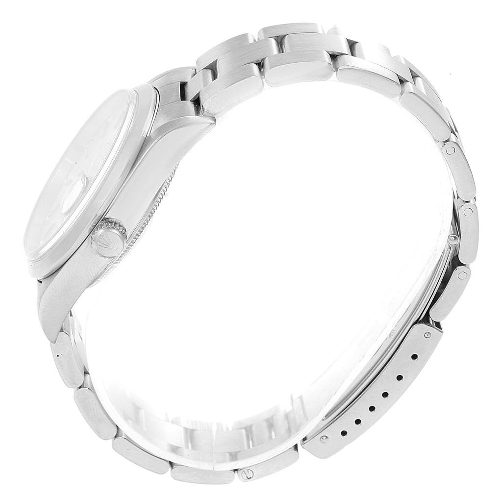 The image shows a Rolex Date 15200 Men's Stainless Steel Silver Dial 15200 Men's Stainless Steel Silver Dial model watch from a side view, highlighting the case, crown, and metal bracelet.