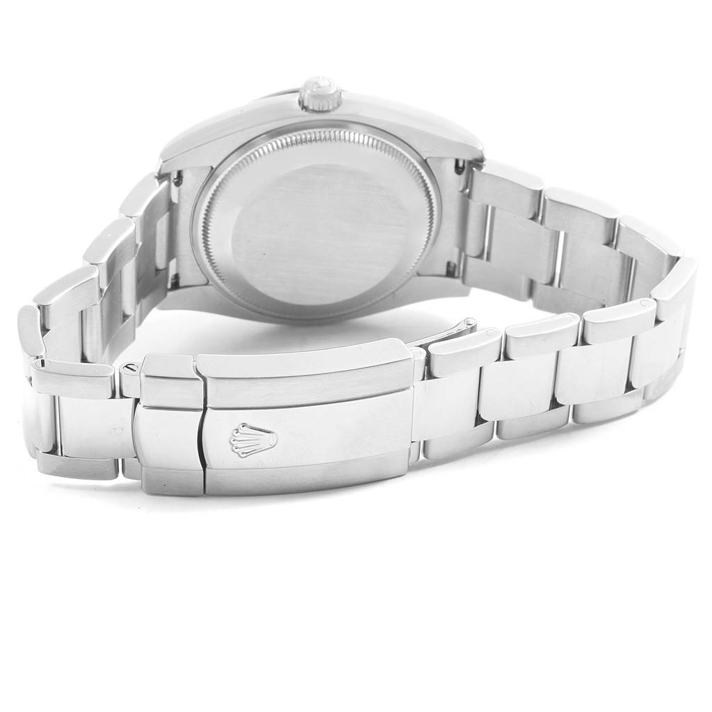 The image shows the back case and metal bracelet with the clasp of a Rolex Date 115210 Men's Stainless Steel Blue Dial 115210 Men's Stainless Steel Blue Dial model watch from a rear angle.