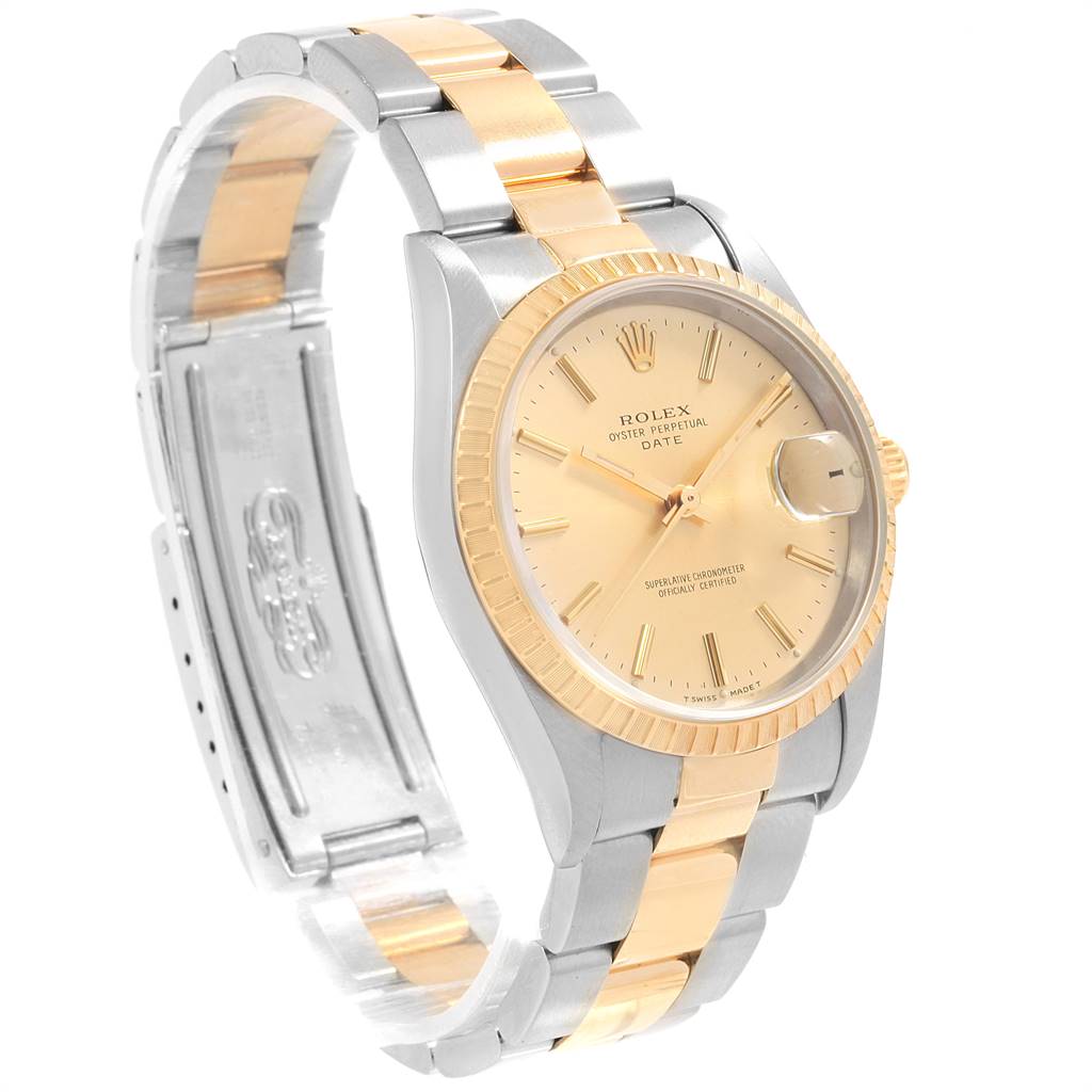 The Rolex Date 15223 Men's Steel and Gold (two tone) Champagne Dial 15223 Men's Steel and Gold (two tone) Champagne Dial model watch is shown at a slight angle displaying the face, bezel, and bracelet.