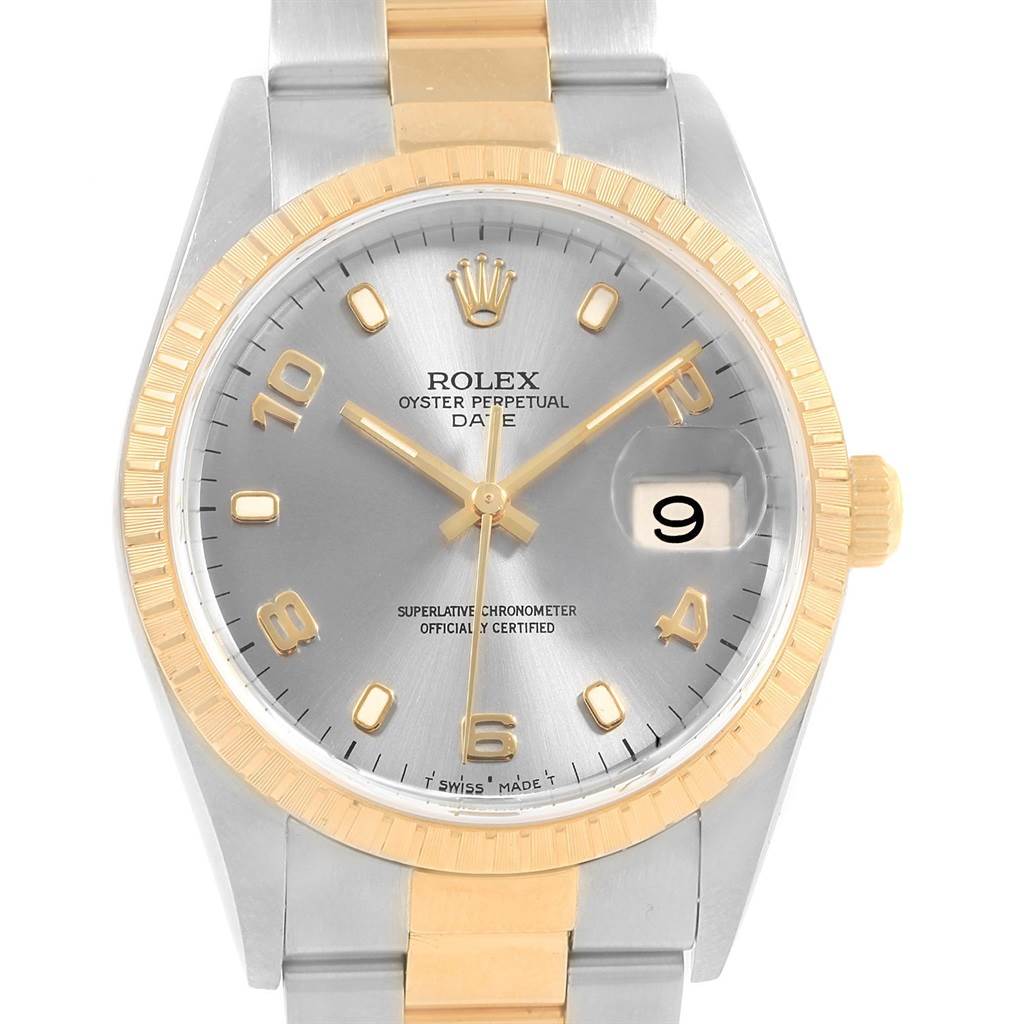 The image shows a front view of the Rolex Date 15223 Men's Steel and Gold (two tone) Grey Dial 15223 Men's Steel and Gold (two tone) Grey Dial watch, highlighting the dial, bezel, hands, and bracelet.