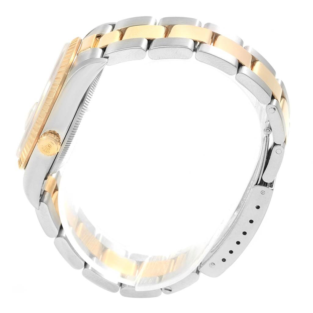 This image shows a side view of a Rolex Date 15223 Men's Steel and Gold (two tone) Grey Dial 15223 Men's Steel and Gold (two tone) Grey Dial watch, highlighting the case, bezel, crown, and two-tone bracelet.