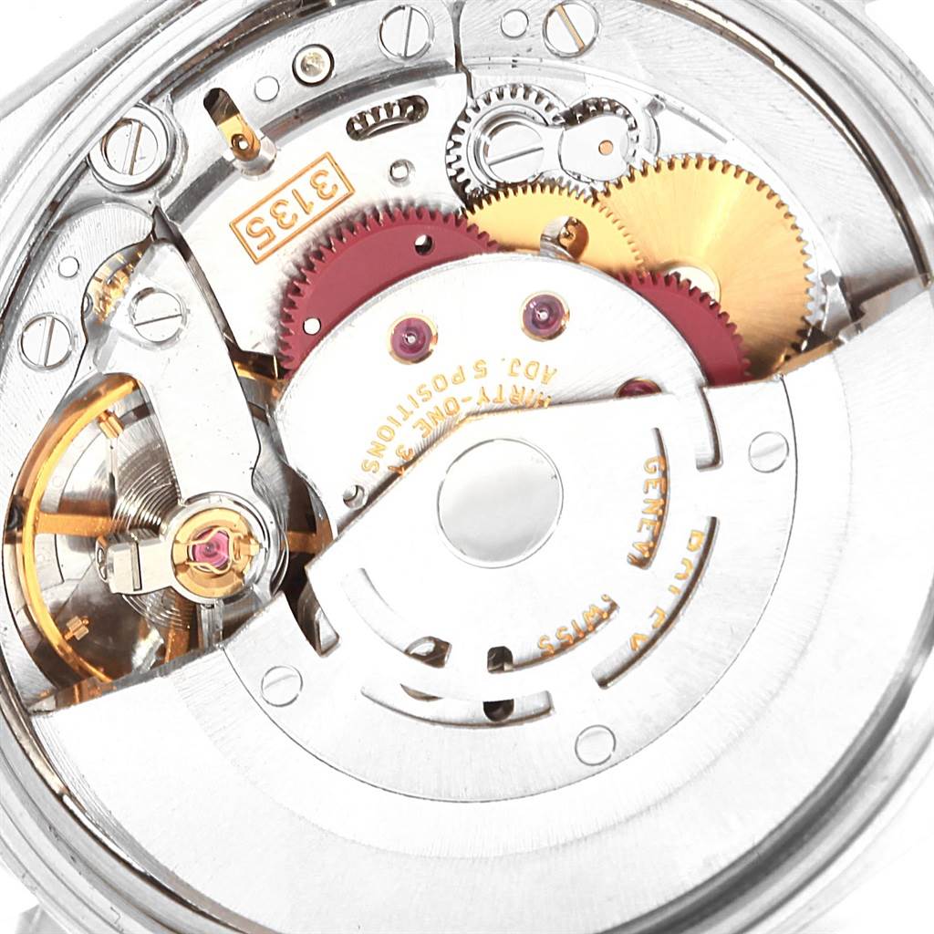 This image shows the internal mechanism with gears, jewels, and the rotor of a Rolex Date 15200 Men's Stainless Steel White Dial 15200 Men's Stainless Steel White Dial model watch.